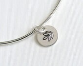 One Sterling Silver Bangle with Multi Leaf Stamped Charm