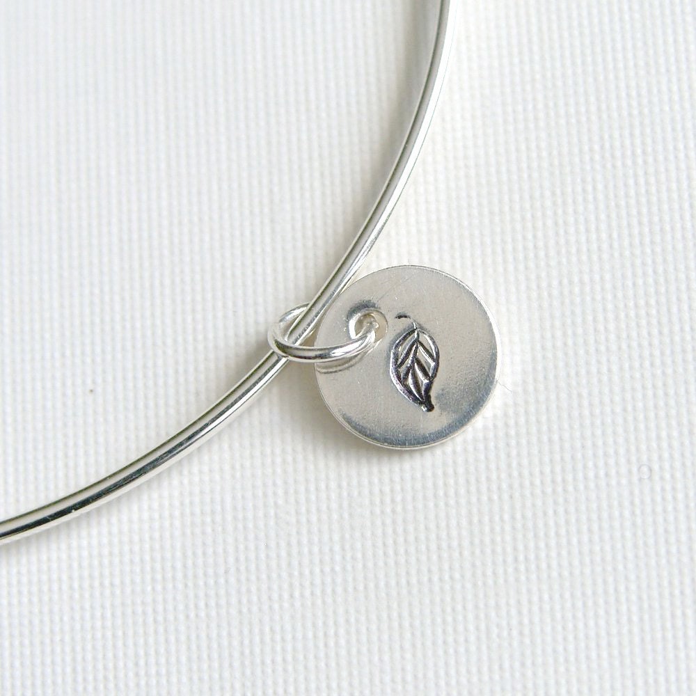 One Sterling Silver Bangle with Leaf Stamped Charm