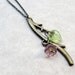 Antiqued Brass Twig Pendant - Purple Flower and Glass Leaf Beads - Beaded Twig Necklace