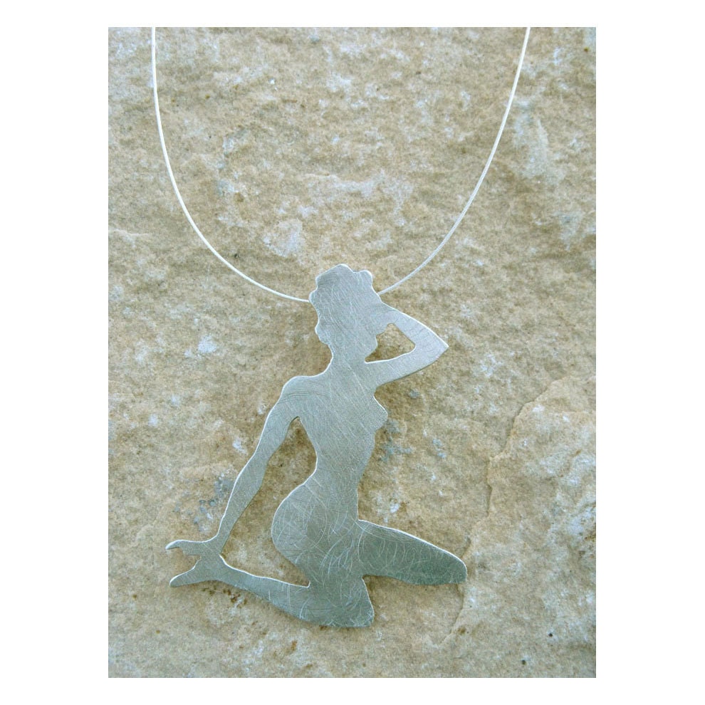 Super cute sexy pinup necklace on light silver cord