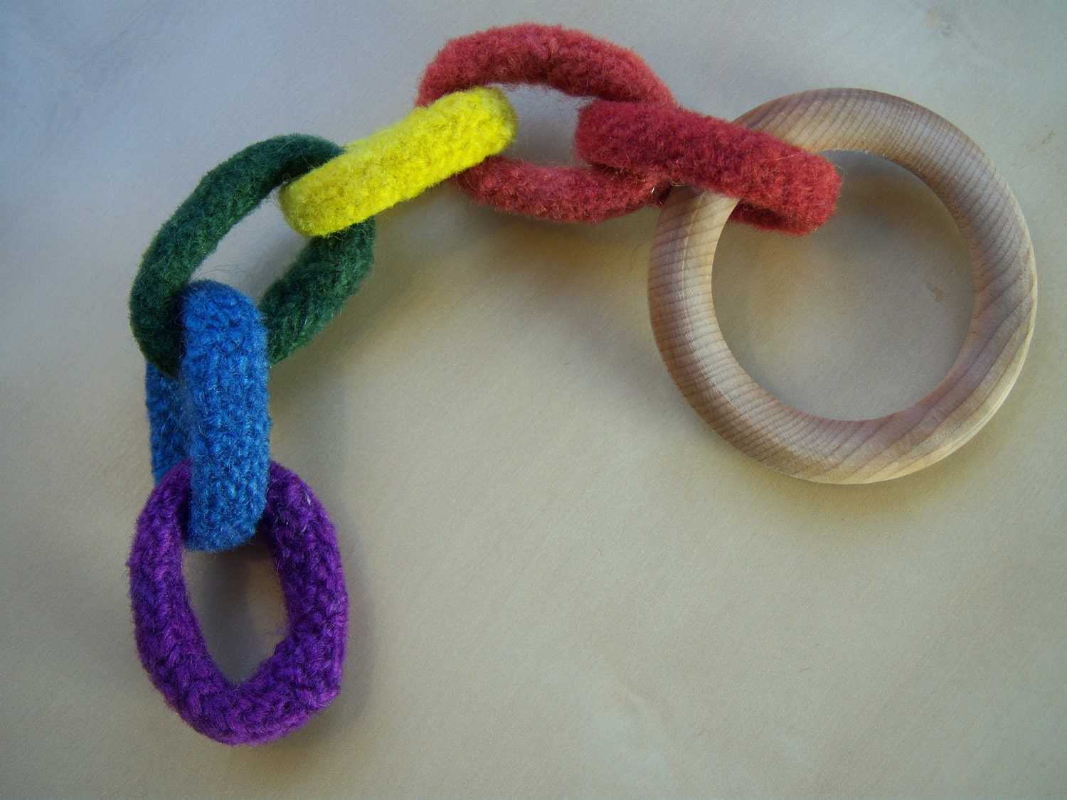 Waldorf Baby Toy - Maple Wood Teething Ring - Felted Wool Links in Plant Dyed Rainbow Colors - Red, Orange, Yellow, Green, Blue, Purple