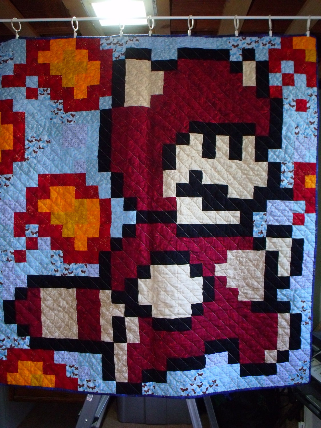 Raccoon Suit Mario Lap Quilt