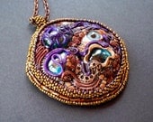Other worldly landscape bead embroidered polymer clay pendant