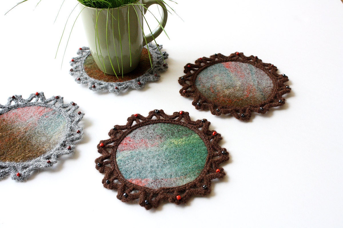 The same as different" Wool felted tea coasters