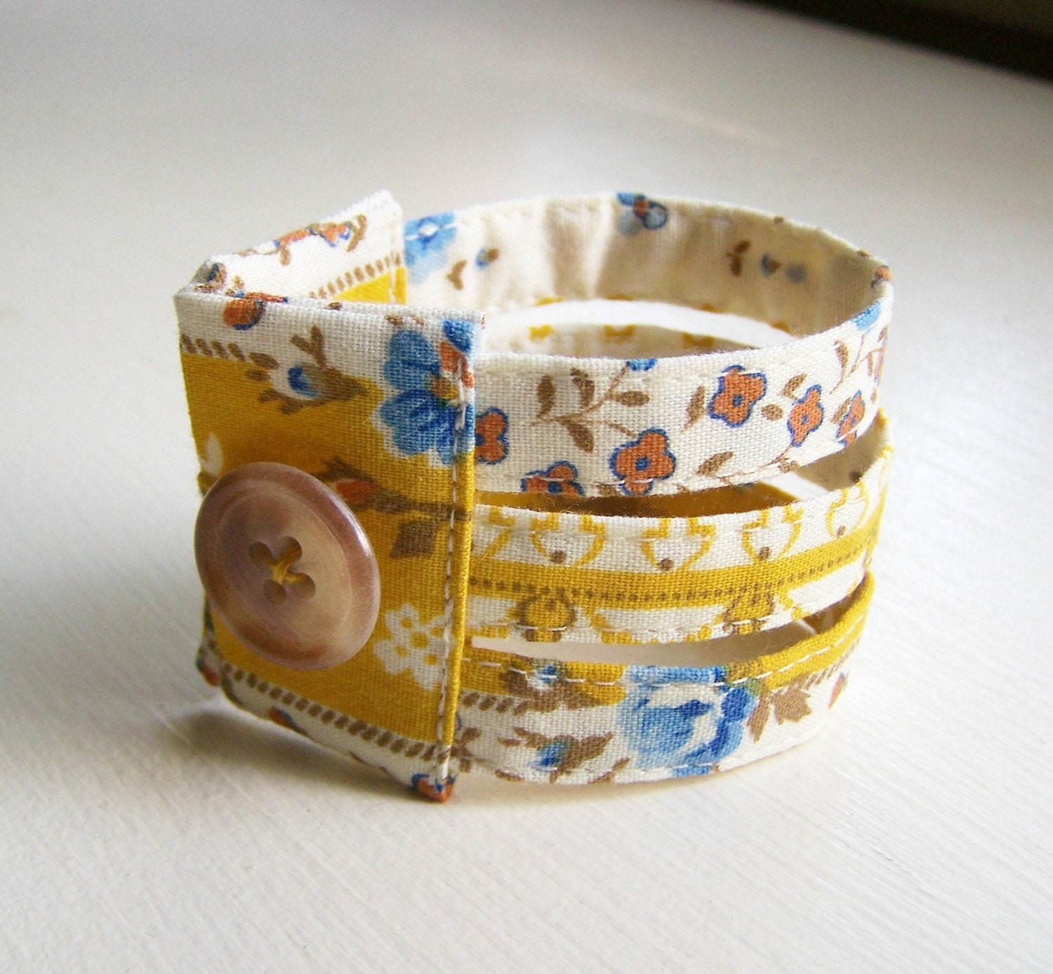 Triple strand cuff bracelet in vintage golden autumn floral