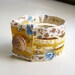 Triple strand cuff bracelet in vintage golden autumn floral