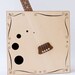 Angled neck Square guitar.