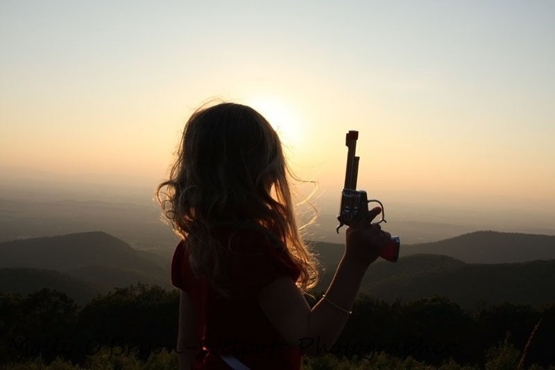 Rockabilly photograph Little Cowgirl with Pistol color print in the mountains at sunset Country Western, Indie Art
