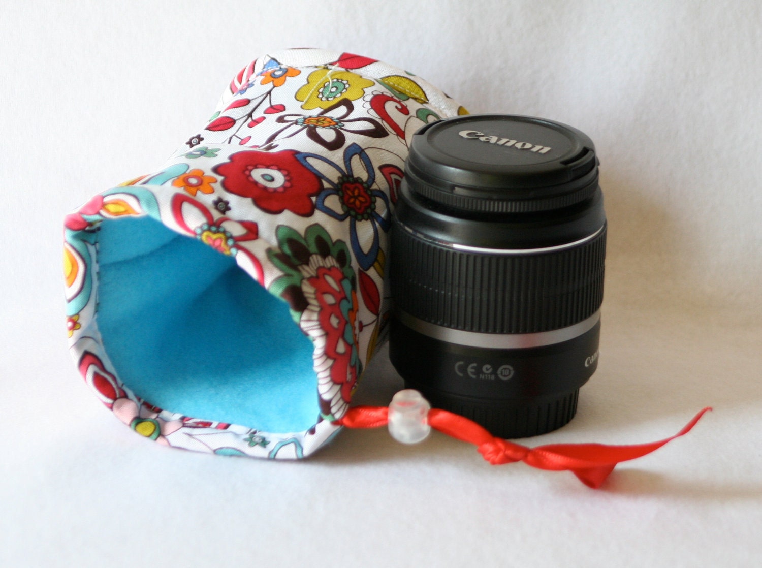 Camera lens case for DSL camera turquoise, red  and orange funky floral print monogramming included