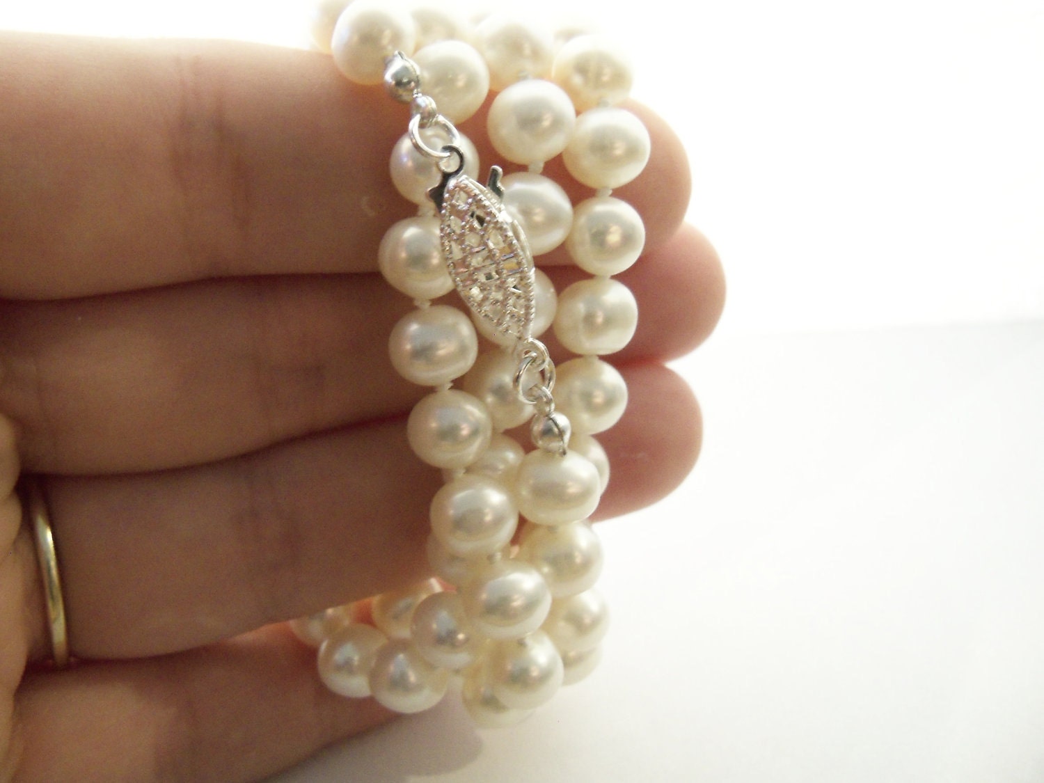 White freshwater pearl wrap bracelet or necklace AA grade 7.5mm knotted on white silk with silver plated filigree clasp
