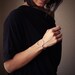 Minimalist silver bracelet of a focal circle shape forged, soldered and hand formed into comfortable, elegant wrist jewelry - "Centre Cuff"