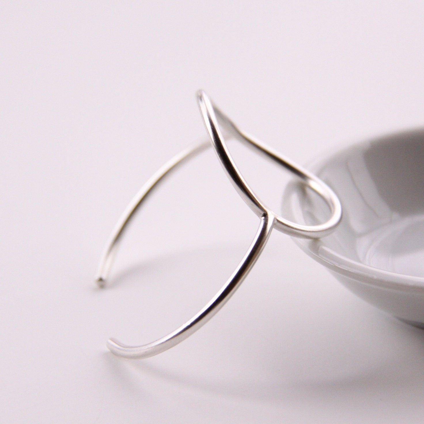 Minimalist silver bracelet of a focal circle shape forged, soldered and hand formed into comfortable, elegant wrist jewelry - "Centre Cuff"