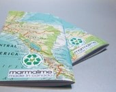 2 notebooks made with post-consumer, reused, rescued, and found papers