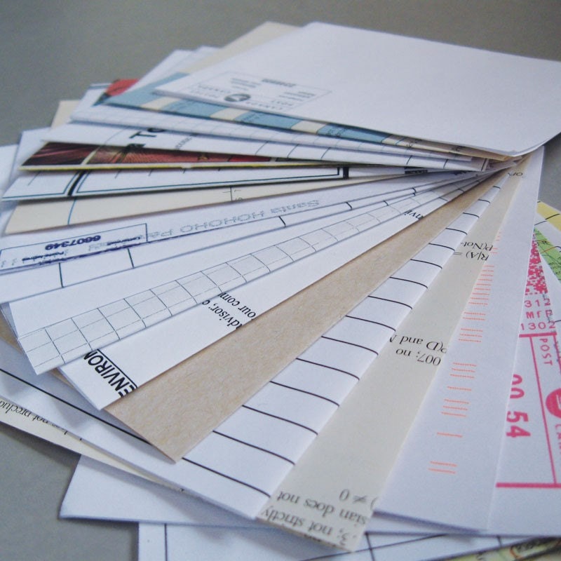 2 notebooks made with post-consumer, reused, rescued, and found papers