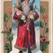 Vintage Postcard - Rare Brown Fur Santa - with toys and gun - early 1900's