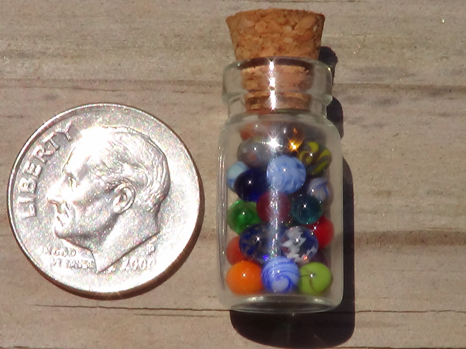 30 to 40 Miniature Glass Marbles by J. R. Hooper