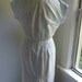 Pretty white eyelet vintage dress with pale blue accents