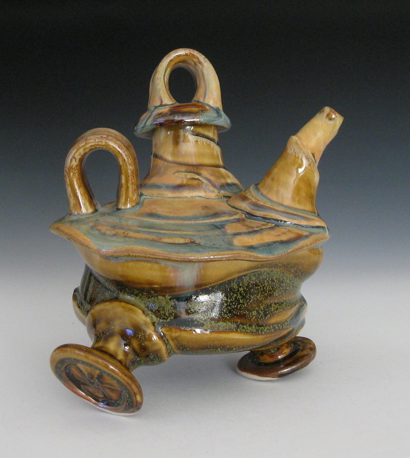funky footed loopy handle teapot