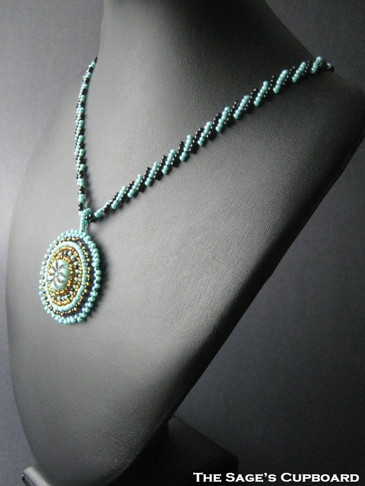 Turquoise Blue Pendant. Bead Embroidery Medallion with Black and Aqua Striped Chain