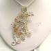 Horse Pendant Sapphire, Zircon, and Sterling Silver