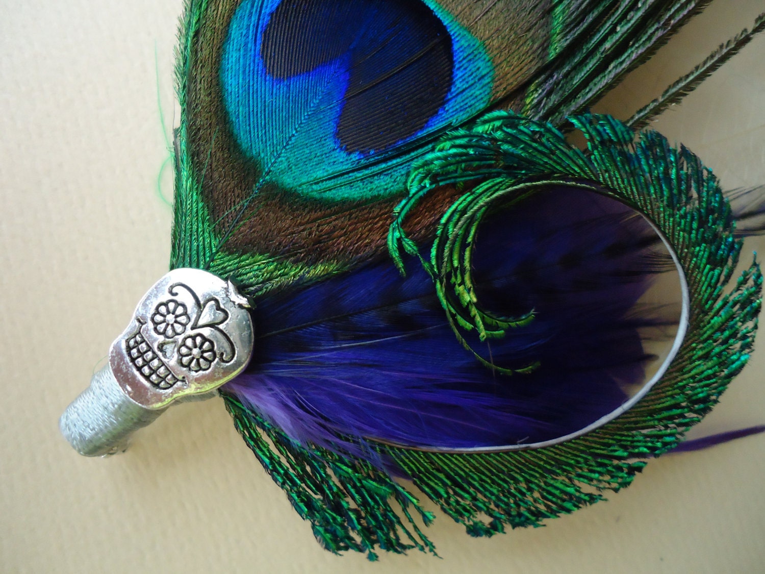 Peacock boutonniere with skull by eeek