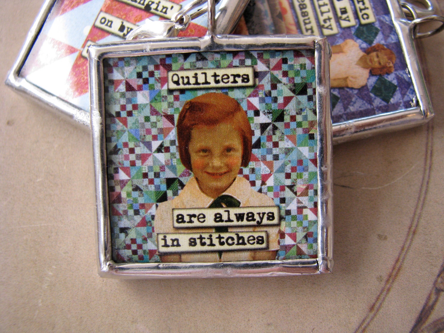 Quilters are always in stitches 1.5" soldered pendant