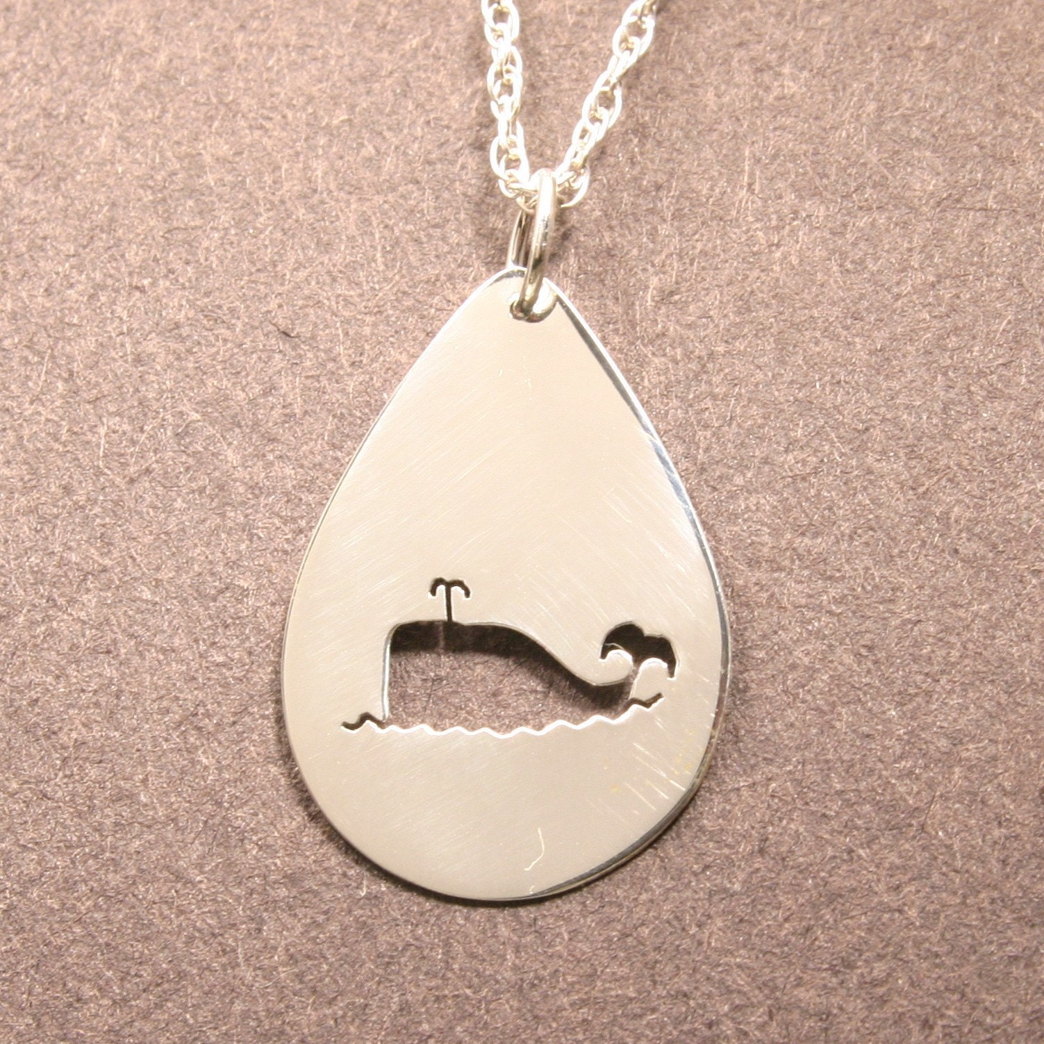 Whale charm, silver cutout pendant, handmade in Maine