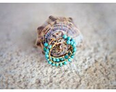 Golden wire wrapped  earrings.Tourqise beads.