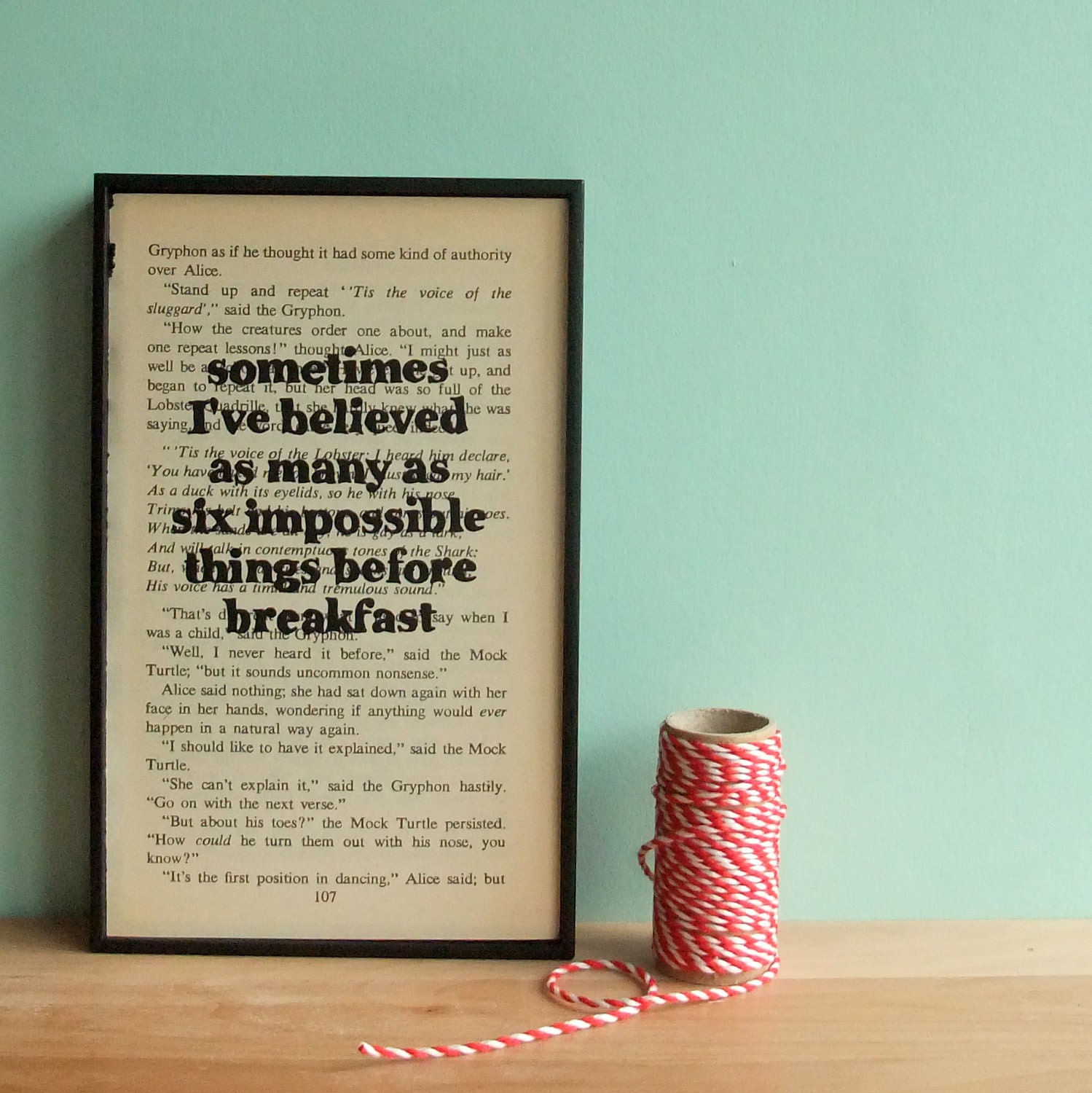 Alice in Wonderland Quote on framed vintage book page - six impossible things