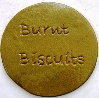 Ceramic Bread Warmer/Trivet engraved Burnt Biscuits