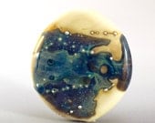 Lampwork bead, handmade glass focal bead in ivory, cream, blue, black purple, green, yellow with silver details - ShedBeads