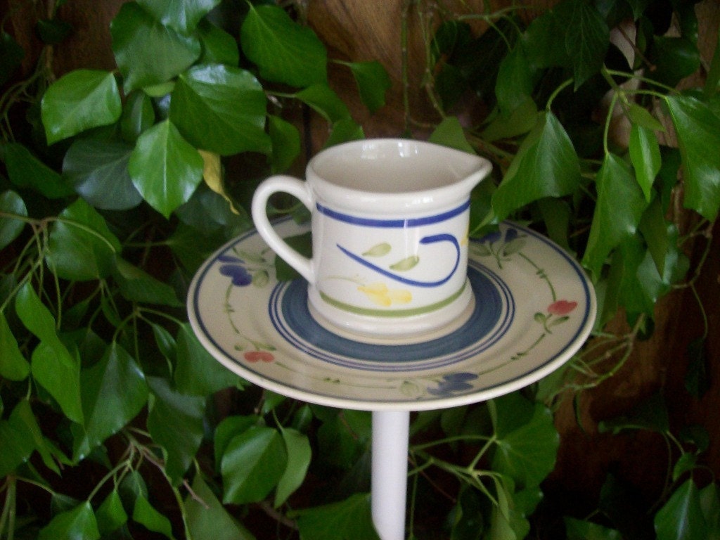Creamer and saucer birdfeeder poke