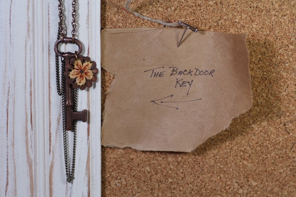 The Backdoor Key - Vintage Skeleton Key and Brass Flower Necklace by Prairieoats