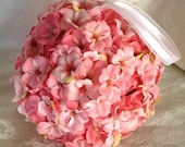 Pink petite flowers make up "April Love" kissing ball.
