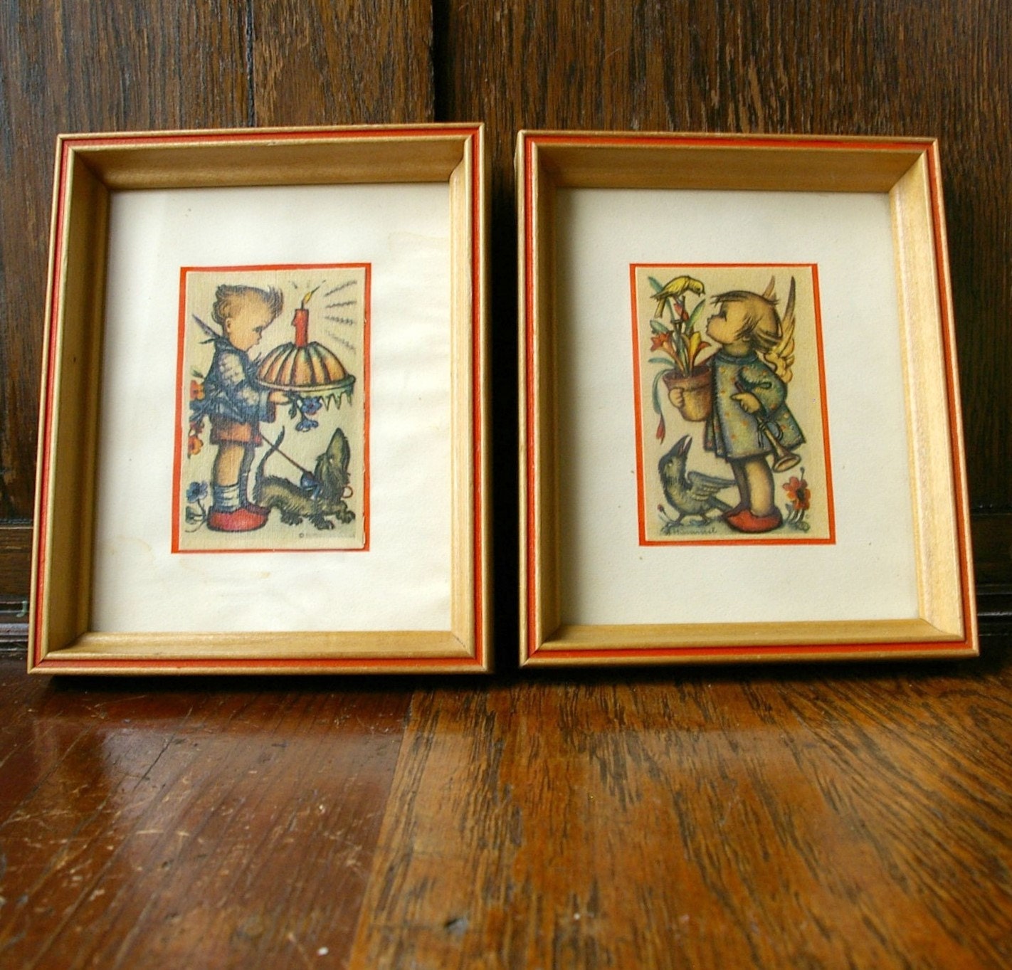 Pair of Children in Blond and Orange Striped Wood Frames, by Hummel