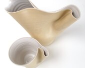 Skinny combination: a ewer and a mug for water or a wine