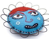 Folk Art Flower Face Sculpture, wire and felt