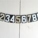 1 vintage metal number, choice of numbers, dollars or cents signs