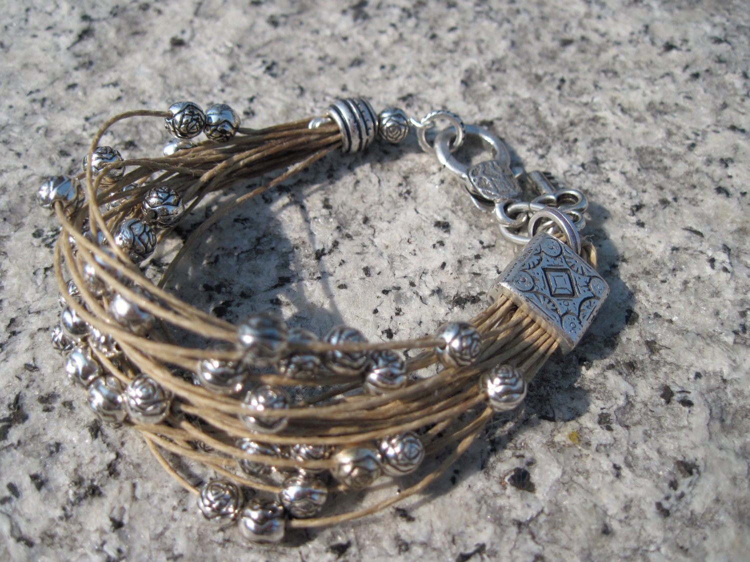 Hemp string bracelet and silver beads