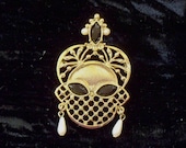 Exotic Gold Mask Brooch Pin