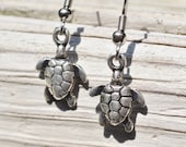 Tiny turtle earrings in rustic metals