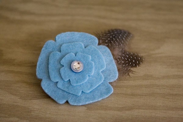 Light blue felt flower w/feathers hair clip