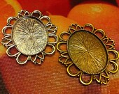 Antique Brass & Antique Silver 40x30mm settings.  2 pieces, 1 of each.