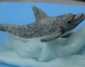 Small needle felted dolphin