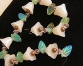 White Bell Flowers and Green Leaf Beads, String of 40 Beads