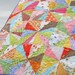a baby starburst quilt - munki munki version - reserved for Catherine