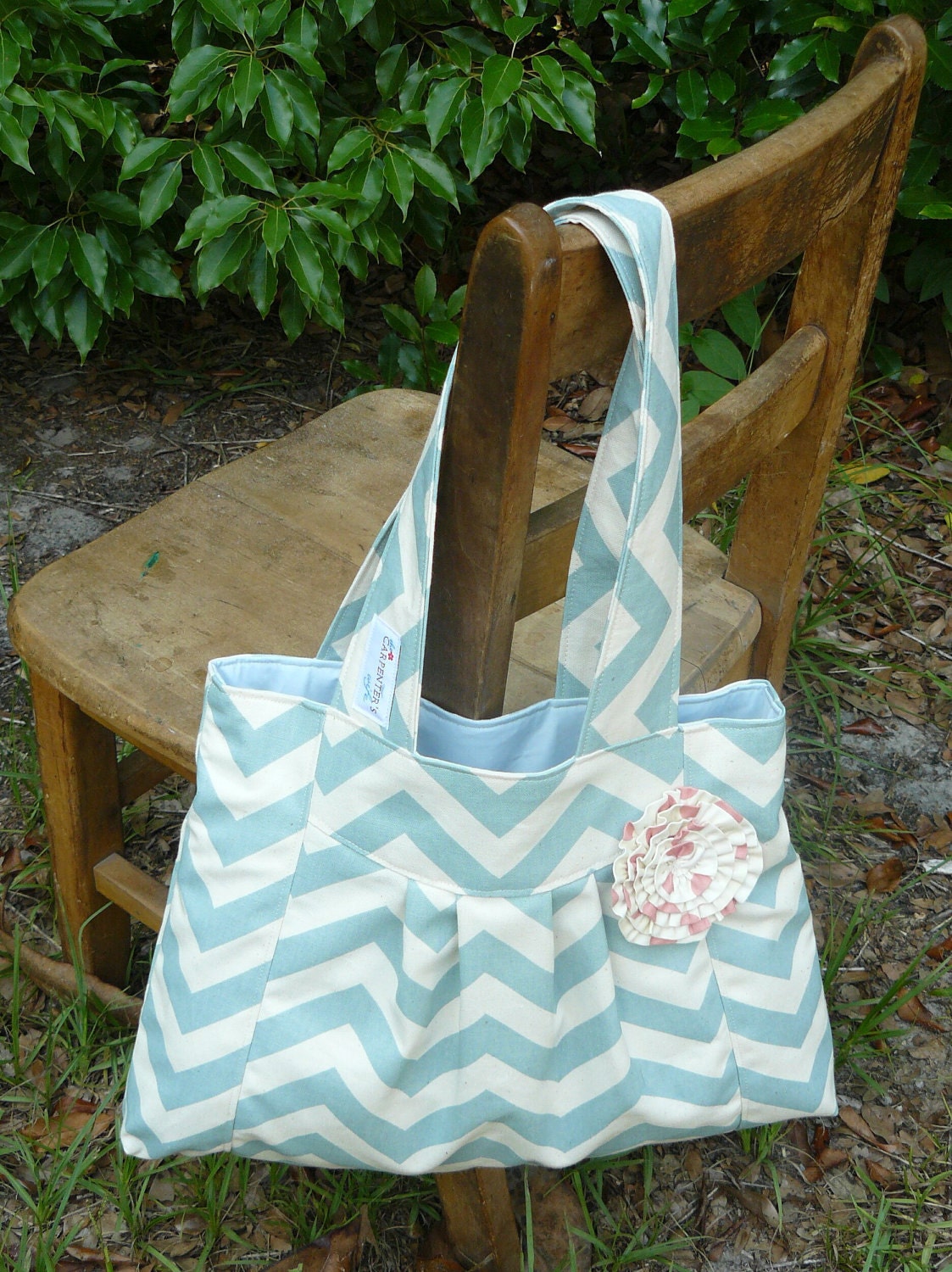 The JuJu Blue Chevron,  pleated Diaper Bag with Pink polka dot  rosette