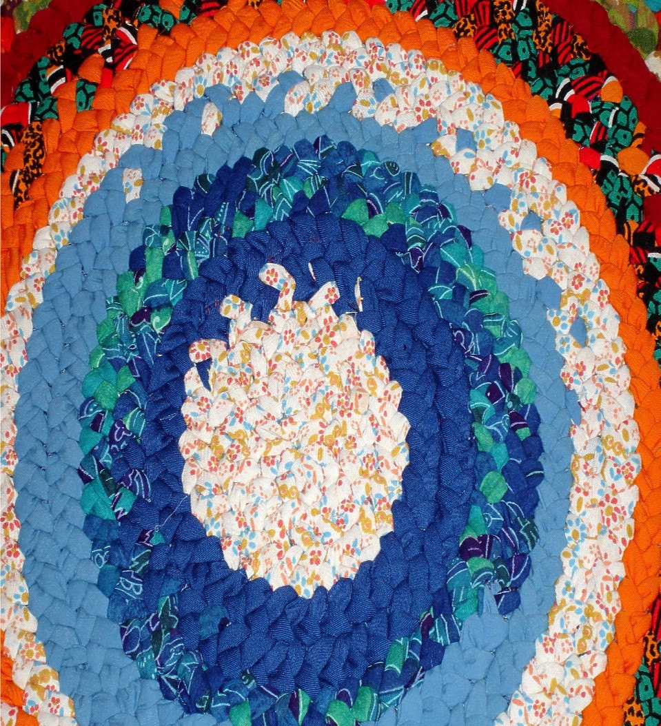 34 in Round 4-strand Braided Rug Handmade Red, Orange Vivid Blues