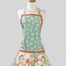 Flounce  / Flattering Retro Style in Beautiful Fandango Design of Turquoise and Melon Orange