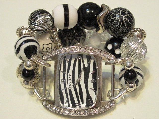 Black, white and clear with silver accent beads double stranded interchangeable watch band includes zebra watch face with rhinestones